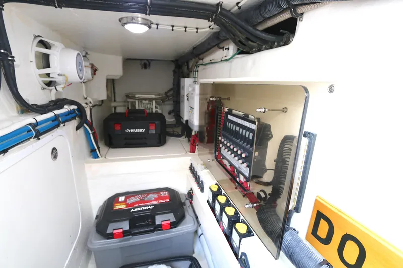  Yacht Photos Pics 2012 Intrepid 475 Sport Yacht engine room with electrical panel and storage.