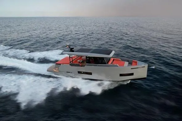  Yacht Photos Pics 2025 De Antonio Yachts D50 cruising on open water, showcasing sleek design and modern features.