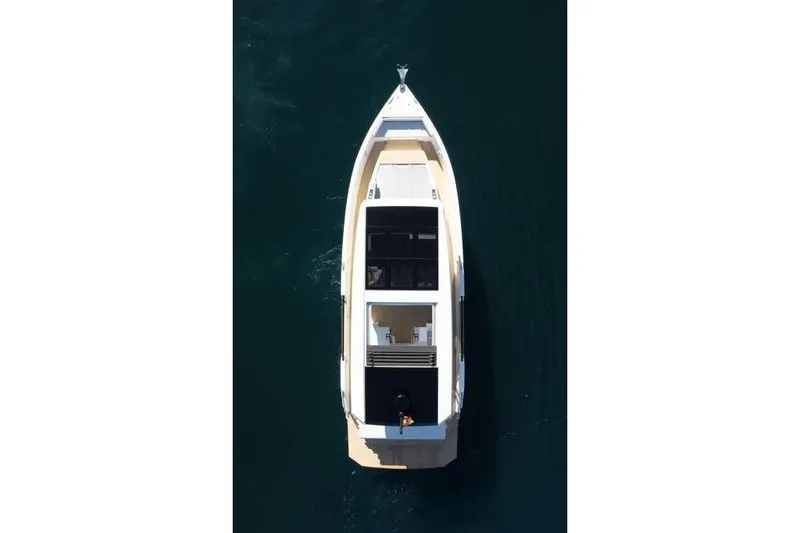  Yacht Photos Pics Overhead view of 2025 De Antonio Yachts D50 on calm water.