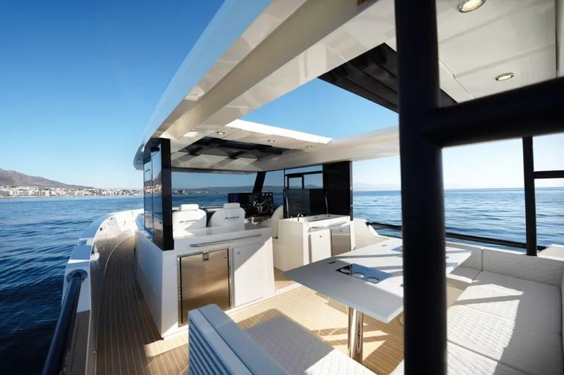  Yacht Photos Pics 2025 De Antonio Yachts D50 luxury yacht interior with modern design on open water.