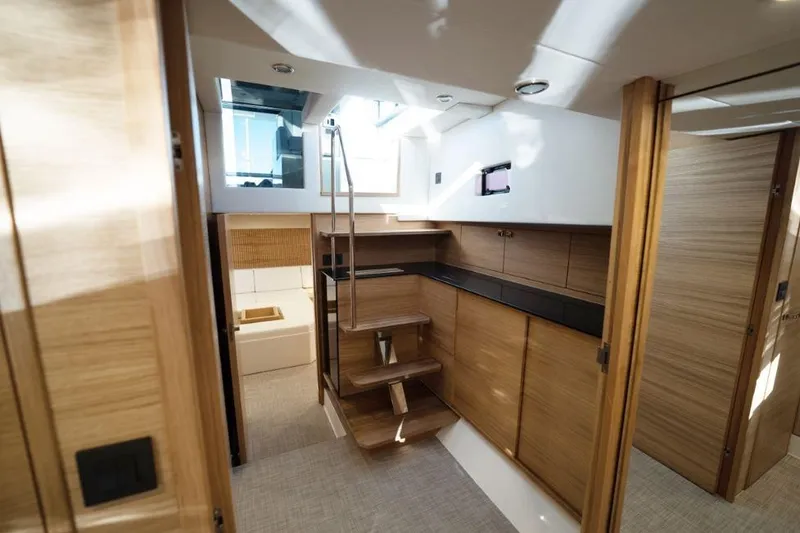  Yacht Photos Pics Interior of 2025 De Antonio Yachts D50, featuring modern wood finishes and sleek design.