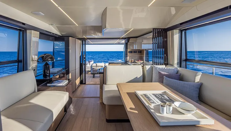  Yacht Photos Pics Luxurious interior of 2024 Absolute 56 FLY yacht with ocean view.