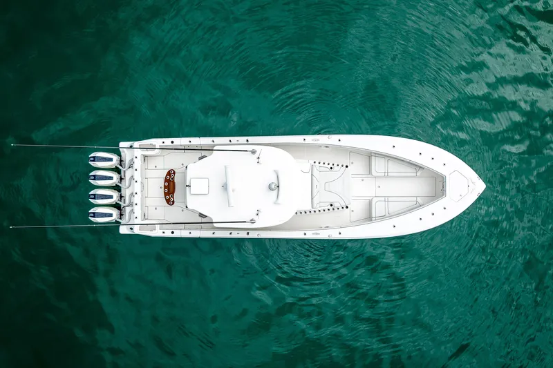  Yacht Photos Pics Aerial view of 2024 SeaVee 420Z boat on turquoise water.