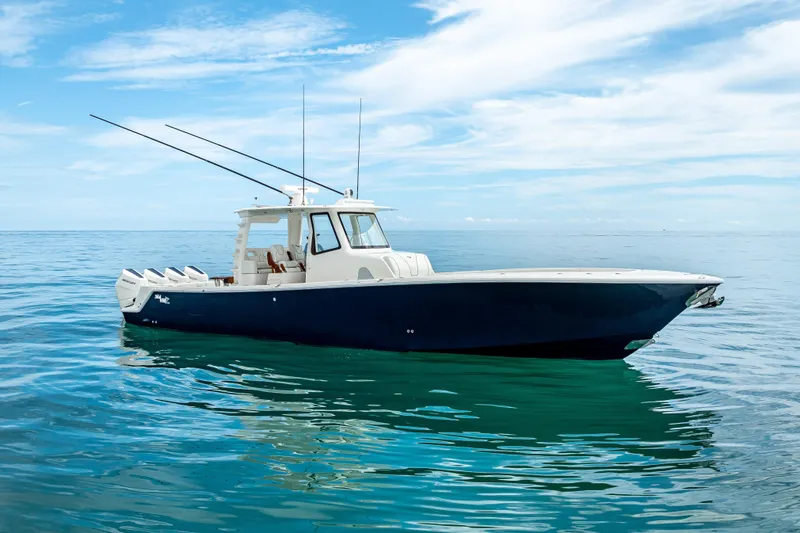  Yacht Photos Pics 2024 SeaVee 420Z boat on calm ocean waters under a clear sky.