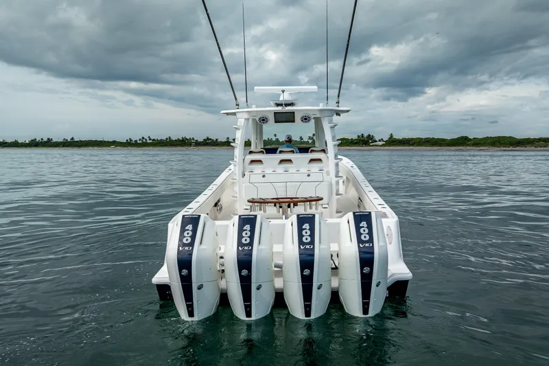  Yacht Photos Pics 2024 SeaVee 420Z boat with four powerful 400 V10 engines on calm water.