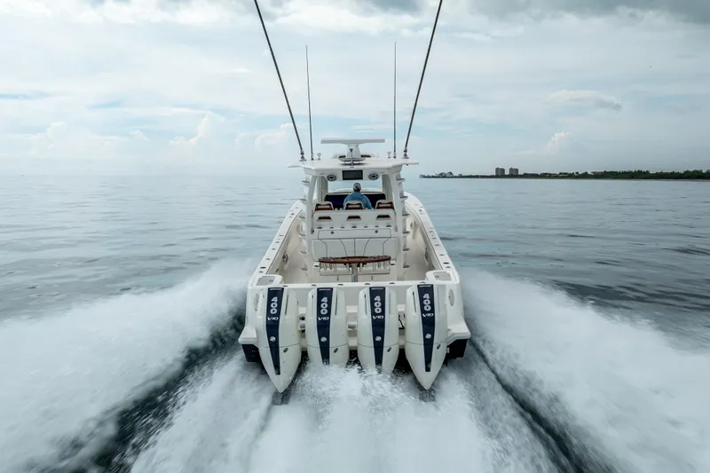  Yacht Photos Pics 2024 SeaVee 420Z boat cruising on open water with powerful engines.