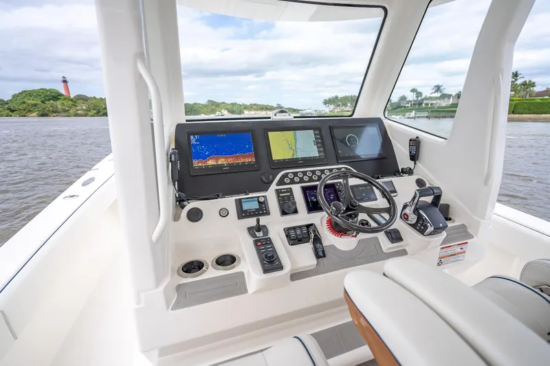  Yacht Photos Pics 2024 SeaVee 420Z boat cockpit with advanced navigation and control systems.