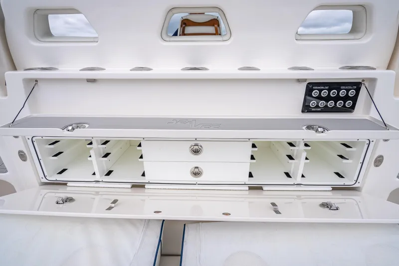  Yacht Photos Pics 2024 SeaVee 420Z boat storage compartment with drawers and control panel.
