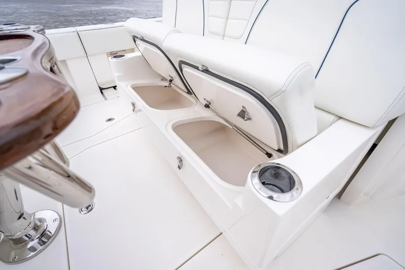  Yacht Photos Pics 2024 SeaVee 420Z boat interior with open storage compartments and sleek seating design.