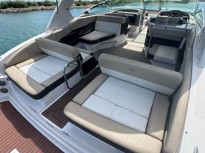  Yacht Photos Pics Luxurious 2013 Regal 3200 Bowrider boat interior with spacious seating and elegant design.