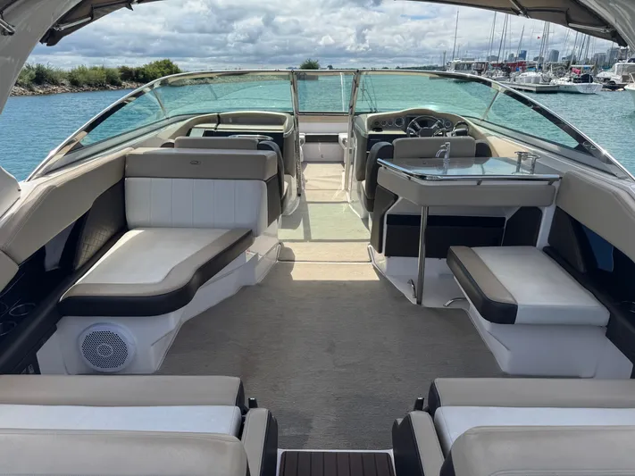  Yacht Photos Pics Luxurious 2013 Regal 3200 Bowrider boat interior with spacious seating and sleek design.