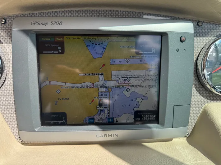  Yacht Photos Pics Garmin GPSmap 5208 displaying navigation map on 2013 Regal 3200 Bowrider dashboard.