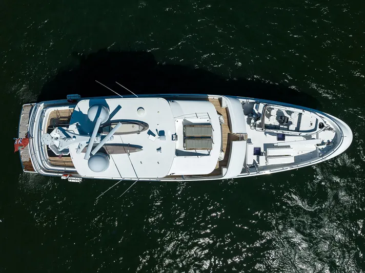 Lacey Kay Yacht Photos Pics Aerial view of a 2017 Nordhavn 96 yacht cruising on the water.