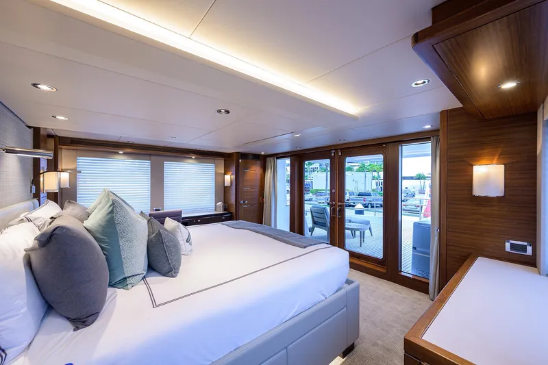 Lacey Kay Yacht Photos Pics Luxurious master bedroom on a 2017 Nordhavn 96 yacht with modern decor.