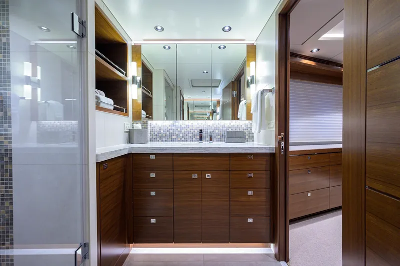 Lacey Kay Yacht Photos Pics Luxurious bathroom in a 2017 Nordhavn 96 yacht with modern wood cabinetry.