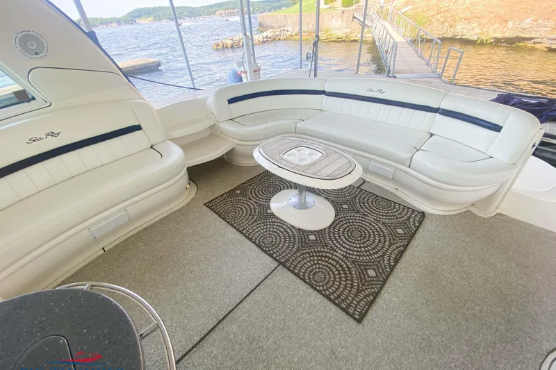  Yacht Photos Pics Luxurious 2007 Sea Ray 52 Sundancer yacht interior with elegant seating and scenic water view.