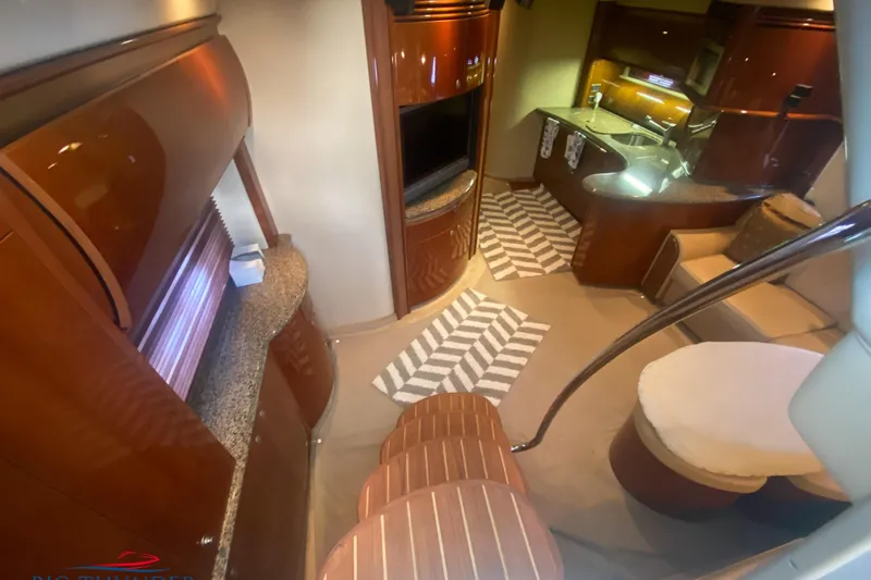  Yacht Photos Pics Luxurious interior of 2007 Sea Ray 52 Sundancer yacht with elegant wood finishes.