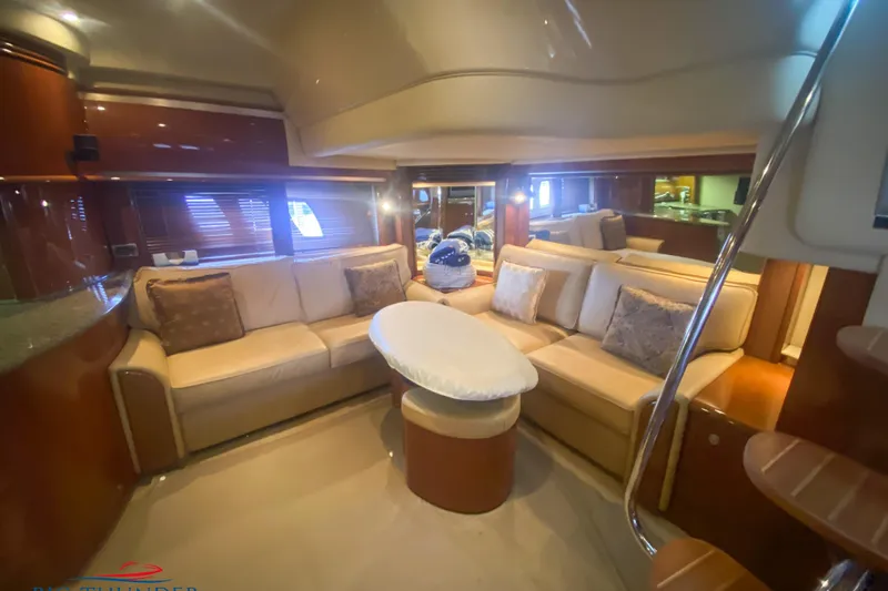  Yacht Photos Pics Luxurious interior of 2007 Sea Ray 52 Sundancer yacht with plush seating and elegant decor.