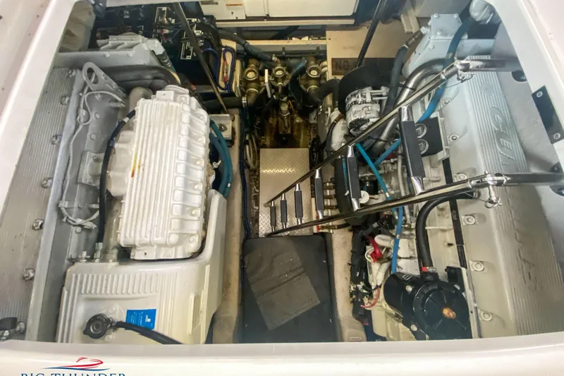  Yacht Photos Pics Engine room of 2007 Sea Ray 52 Sundancer yacht, showcasing dual engines and mechanical components.