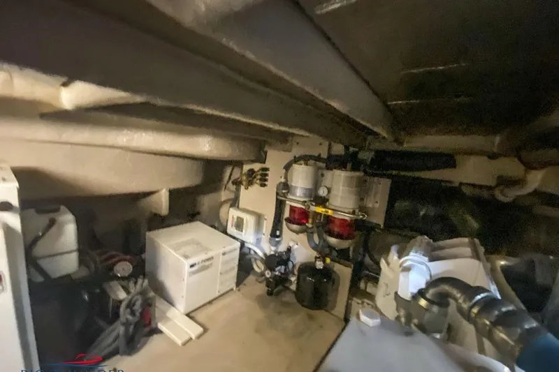  Yacht Photos Pics Engine room of 2007 Sea Ray 52 Sundancer with mechanical components and equipment.