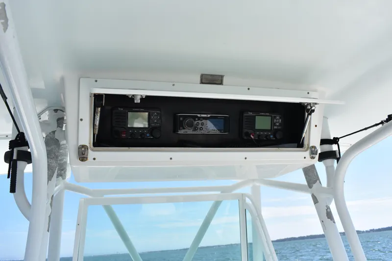  Yacht Photos Pics 2008 Regulator 32 Forward Seating boat electronics compartment with navigation equipment.