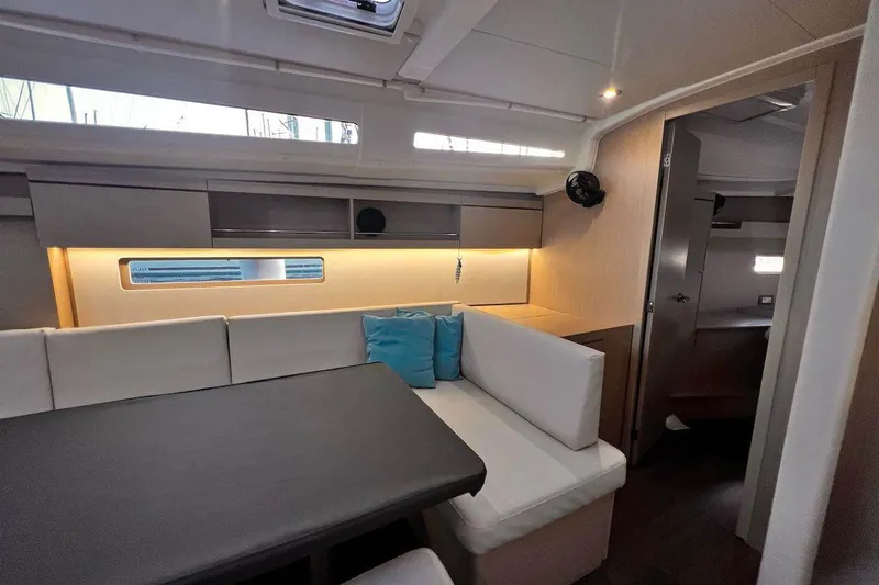  Yacht Photos Pics Interior of 2022 Beneteau Oceanis 40.1 yacht with modern seating and ambient lighting.