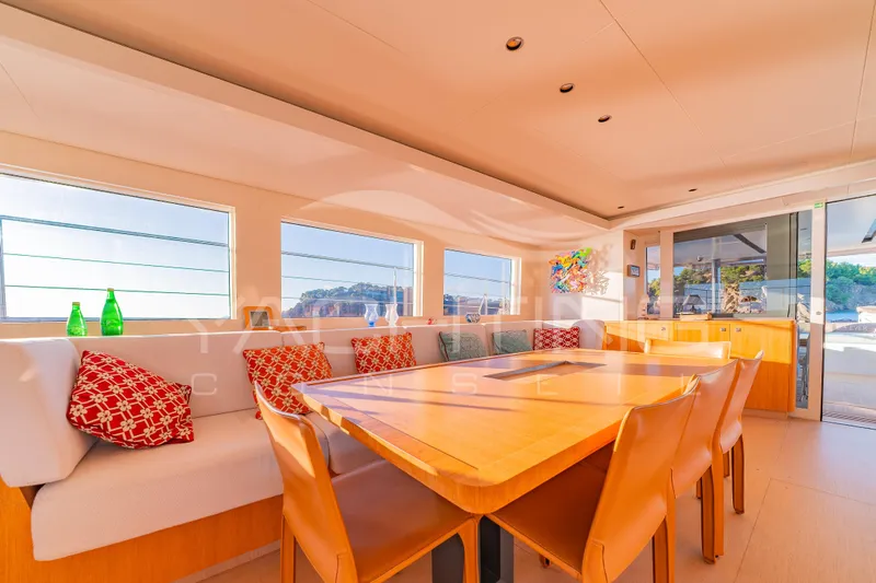 4ever Yacht Photos Pics Luxurious interior of 2022 JFA Yachts LONG ISLAND 78 POWER with elegant dining area.