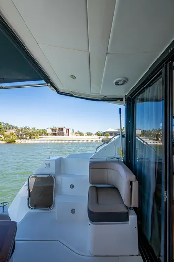  Yacht Photos Pics 2017 Sea Ray Sundancer 400 yacht deck with seating, overlooking serene waters.