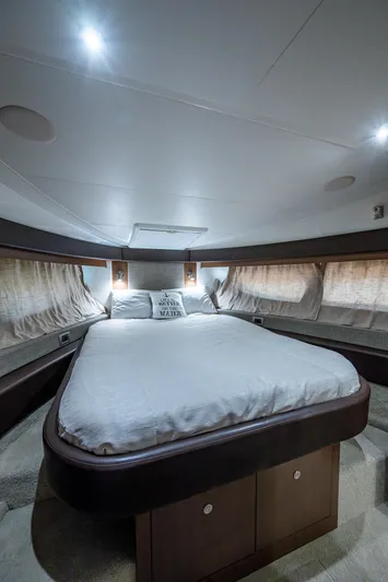  Yacht Photos Pics Luxurious cabin interior of 2017 Sea Ray Sundancer 400 yacht with cozy bed and ambient lighting.