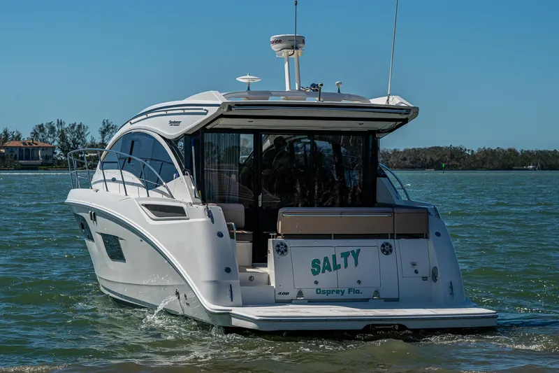  Yacht Photos Pics 2017 Sea Ray Sundancer 400 yacht cruising on calm waters.