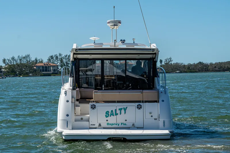  Yacht Photos Pics 2017 Sea Ray Sundancer 400 yacht named "Salty" cruising on a sunny day.