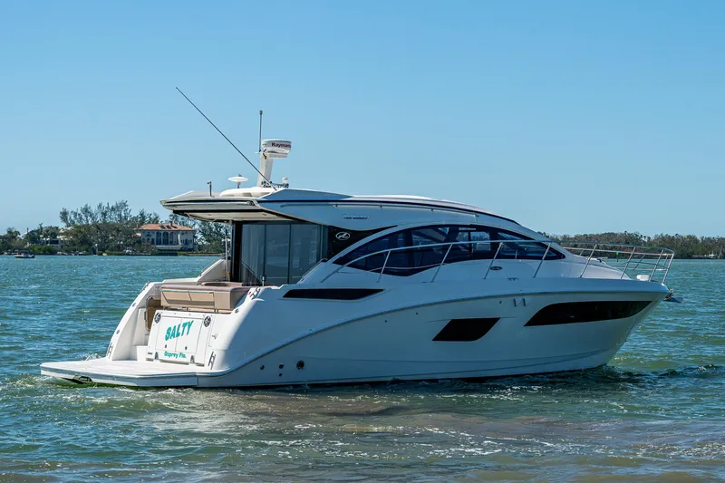  Yacht Photos Pics 2017 Sea Ray Sundancer 400 yacht cruising on a sunny day.