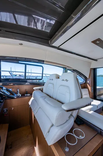  Yacht Photos Pics Interior of 2017 Sea Ray Sundancer 400 yacht with luxurious seating and helm.