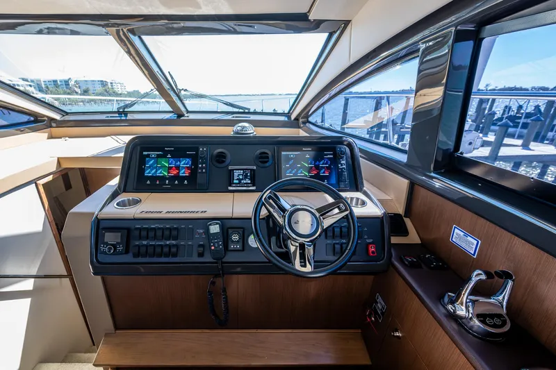  Yacht Photos Pics 2017 Sea Ray Sundancer 400 helm with modern navigation displays and controls.