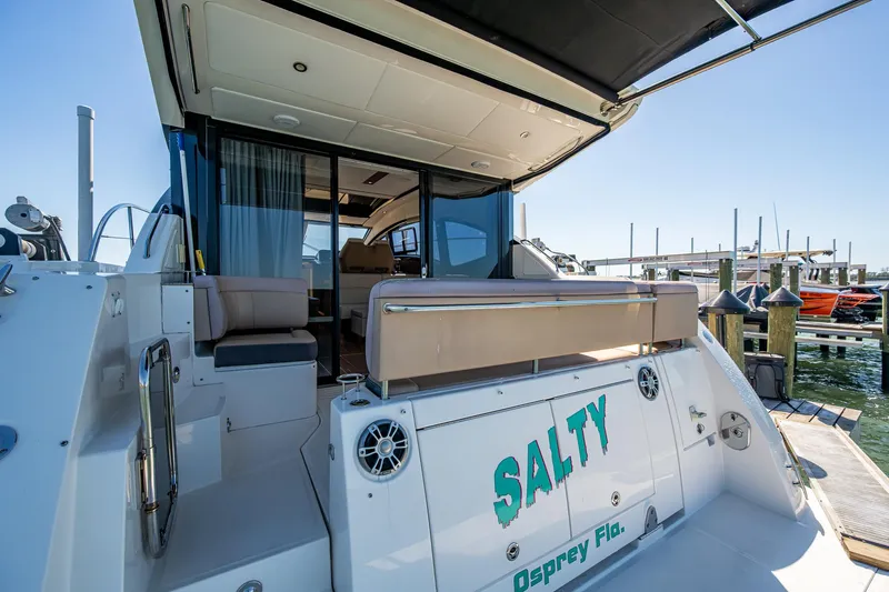  Yacht Photos Pics 2017 Sea Ray Sundancer 400 yacht docked, featuring spacious deck and seating area.