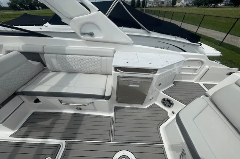  Yacht Photos Pics 2024 Sea Ray SDX 290 Outboard interior with sleek seating and modern design.