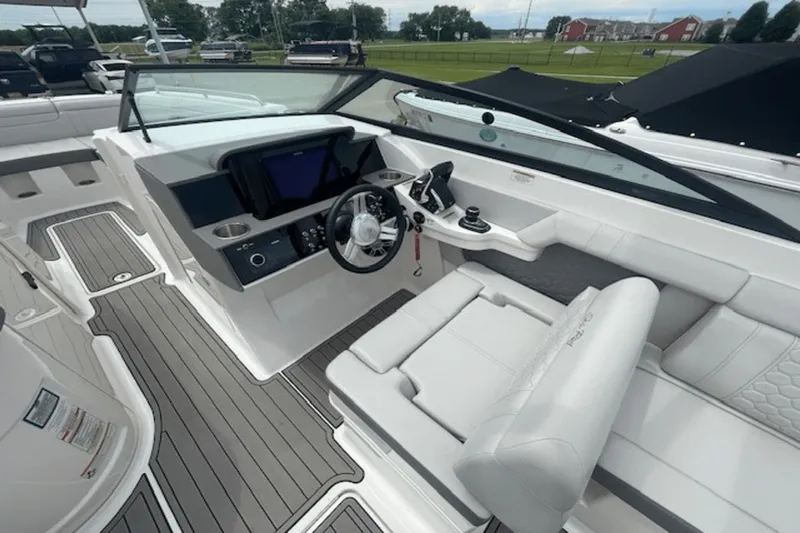  Yacht Photos Pics 2024 Sea Ray SDX 290 Outboard boat interior with modern helm and seating.