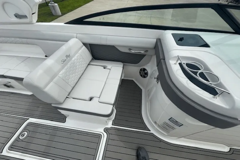  Yacht Photos Pics 2024 Sea Ray SDX 290 Outboard interior with white seating and cup holders.