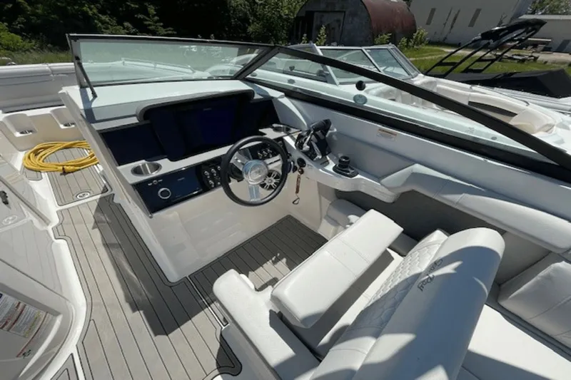  Yacht Photos Pics 2024 Sea Ray SDX 290 Outboard boat interior with modern helm and seating.