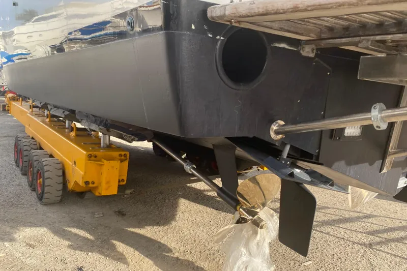  Yacht Photos Pics 1987 Bertram 37 Convertible boat on trailer, showing propeller and hull details.