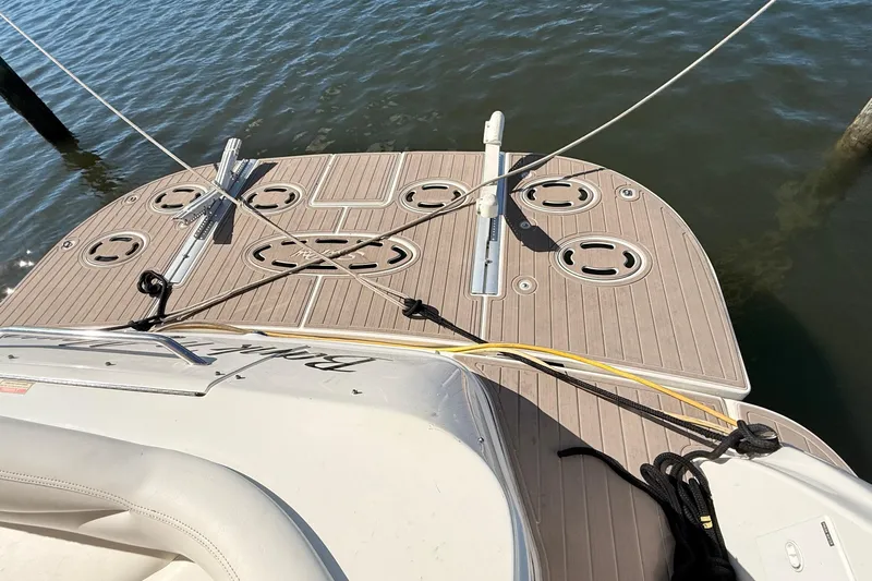 Banking Memories Yacht Photos Pics 2001 Sea Ray 410 Express Cruiser swim platform with mooring lines and water backdrop.