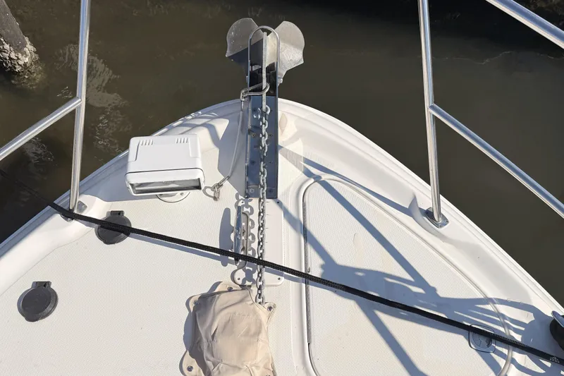 Banking Memories Yacht Photos Pics Bow of 2001 Sea Ray 410 Express Cruiser with anchor and railing.