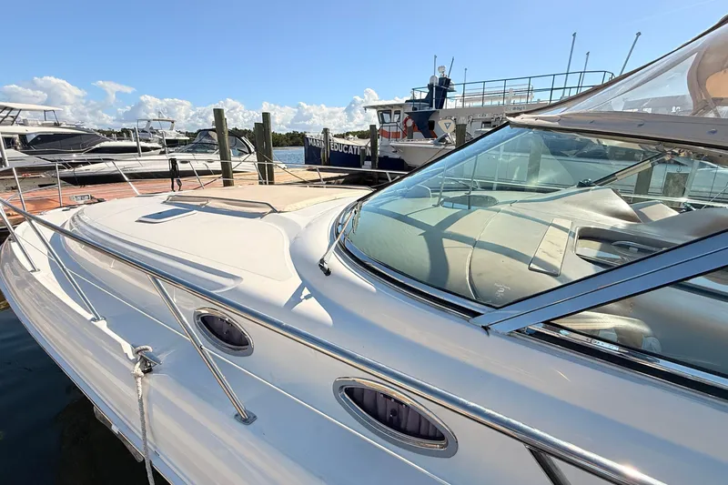 Banking Memories Yacht Photos Pics 2001 Sea Ray 410 Express Cruiser docked at marina under clear blue sky.