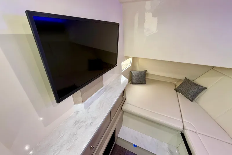  Yacht Photos Pics Interior of 2023 Scout 350 LXZ with TV and cozy seating area.