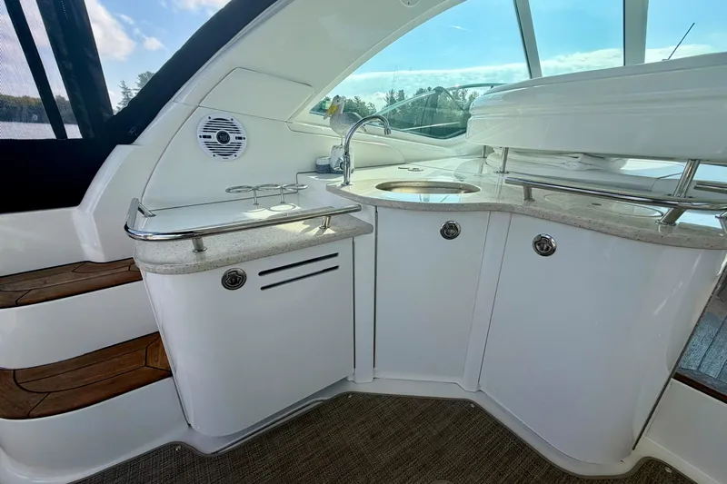  Yacht Photos Pics Luxurious 2009 Sea Ray 48 Sundancer yacht interior with sleek kitchenette and modern design.