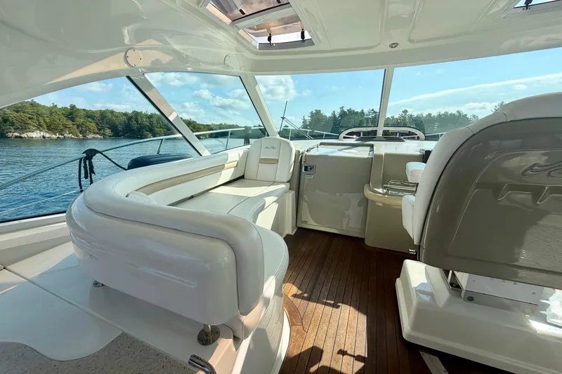  Yacht Photos Pics Luxurious interior of 2009 Sea Ray 48 Sundancer yacht with scenic water view.