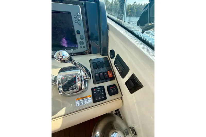  Yacht Photos Pics Control panel of a 2009 Sea Ray 48 Sundancer yacht with navigation equipment.