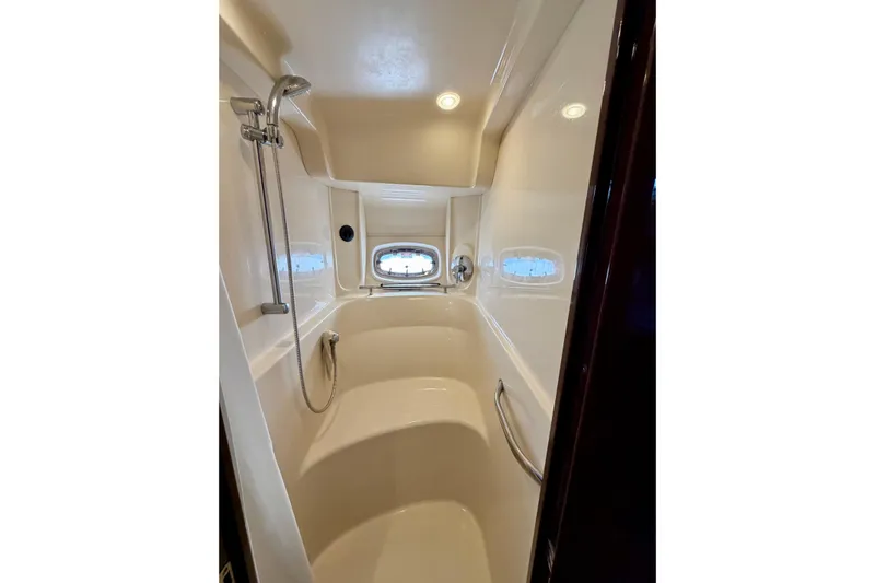  Yacht Photos Pics Luxurious shower area in 2009 Sea Ray 48 Sundancer yacht with modern fixtures.