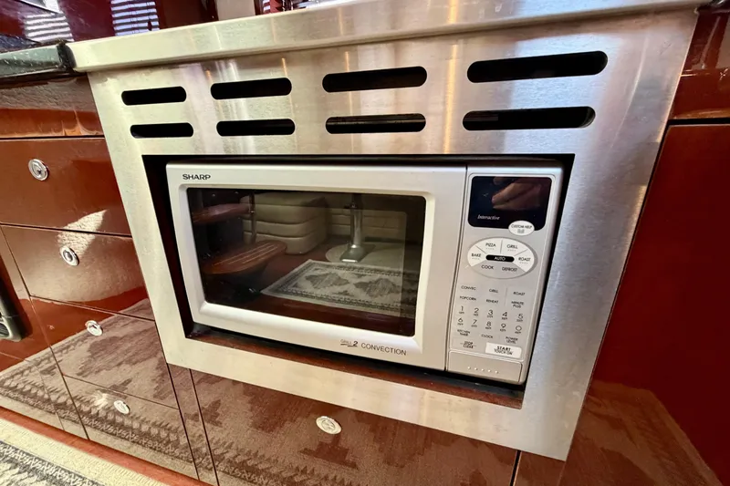  Yacht Photos Pics Built-in Sharp microwave in 2009 Sea Ray 48 Sundancer yacht kitchen.
