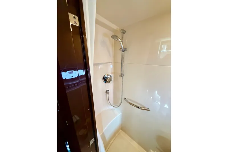 Yacht Photos Pics Shower area in 2009 Sea Ray 48 Sundancer yacht, featuring modern fixtures and sleek design.